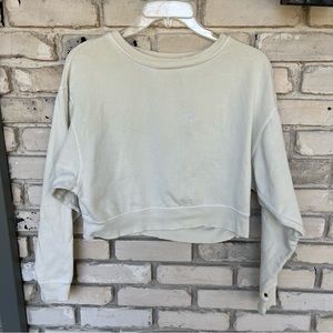 Free people crop distressed long sleeve sweatshirt.